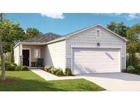Charming single-story home with a two-car garage, landscaped yard, and inviting front porch at 305 Tiliwa Street, Summerville, SC 29486