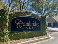 Cambridge Lakes community sign featuring an ivy-covered brick base at 1403 Cambridge Lakes Dr, Mount Pleasant, SC 29464