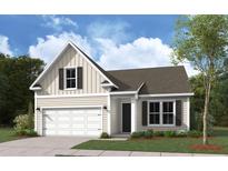 Charming one-story home with neutral siding, a garage, and manicured landscaping at 512 Eagleview Dr, Moncks Corner, SC 29461