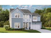 Charming two-story home with blue siding, white trim, a covered porch, and an attached garage at 360 Citrus Dr, Summerville, SC 29486