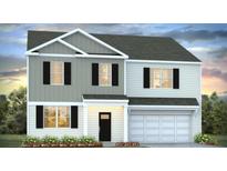Charming two-story home with black shutters, white trim, and a two car garage at 301 Blue Haw Dr, Moncks Corner, SC 29461