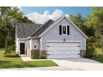 Charming single-Gathering home with a two-car garage, stone accents, and a well-manicured lawn at 1029 Sagegrass St, Summerville, SC 29485