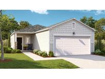 Charming single-story home with a well-manicured lawn, inviting entryway, and attached two car garage at 319 Pine Crest View, Summerville, SC 29486