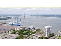 An aerial view showing the property's proximity to the harbor and Ravenel Bridge at 330 Concord St # 4C, Charleston, SC 29401