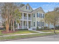 Charming two-story home with double porches, neat landscaping, and traditional shutters at 2615 Rutherford Way, Charleston, SC 29414