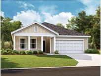 Charming single-story home features a light-colored exterior, attached garage, and well-manicured lawn at 659 Cottage Landing Drive, Summerville, SC 29485