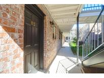 Inviting brick facade featuring a private entrance at number 82, offering a welcoming approach to the residence at 867 Colony Dr # F-82, Charleston, SC 29407