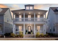 Charming two-story home with double porches and classic architectural details at 1328 Upper Union Rd, Mount Pleasant, SC 29464