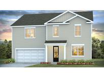 Charming two-story home featuring a two-car garage and a welcoming front porch at 134 Lilac Grove Way, Summerville, SC 29486