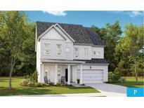 Charming two-story home with a welcoming front porch and a two-car garage, perfect for suburban living at 1010 Swamp Rose Run, Summerville, SC 29485