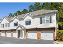 Charming townhome with attached garages and well-maintained landscaping in a desirable community at 1204 Basildon Rd, Mount Pleasant, SC 29466