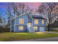 Charming two-story home featuring a modern exterior with a well-manicured front yard at 2901 Newport Pl, North Charleston, SC 29420