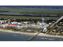 Coastal view of the community and its beautiful surroundings, featuring beach access and nearby waterways at 1300 Ocean Blvd # 221, Isle of Palms, SC 29451