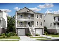 Charming two-story home with double porches, a two-car garage, and classic coastal curb appeal at 1680 Siloh Dr # 469, Mount Pleasant, SC 29466