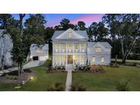 Stunning two-story home with a metal roof and a detached garage, perfect for luxury living at 3864 Summerton St, Mount Pleasant, SC 29466
