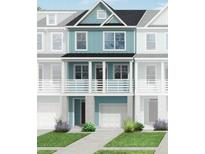Charming three-story townhome with a two-story porch, blue siding, white trim, and well-manicured landscaping at 410 Katies Scenic Ct, Charleston, SC 29492