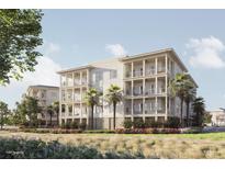 Stunning three-story condo building with private balconies and lush landscaping, perfect for coastal living at 325 Longshore St # 1143, Daniel Island, SC 29492