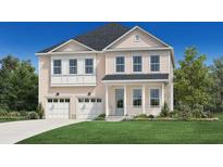 Charming two-story home with a manicured lawn, two-car garage, and welcoming front porch at 2005 Sea Water Dr, Charleston, SC 29412