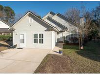 Charming home featuring a well-maintained lawn, inviting entryway, and neutral siding at 2009 Arundel Pl, Mount Pleasant, SC 29464
