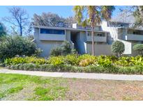 Charming two-story condo with mature trees and landscaping provides great curb appeal at 1142 Village Creek Ln # 3, Mount Pleasant, SC 29464