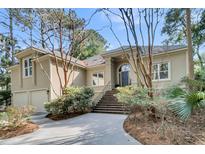 Lovely single Gathering home with manicured front yard, multi-car garage and beautiful landscaping at 216 Sea Marsh Dr, Kiawah Island, SC 29455