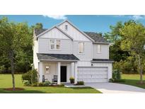 Charming two-story home with white siding, covered porch, and attached two-car garage at 1041 Swamp Rose Run, Summerville, SC 29485