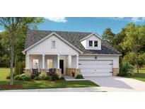 Charming single-Gathering home featuring a two-car garage and a welcoming front porch at 1006 Tulip Shell St, Summerville, SC 29485