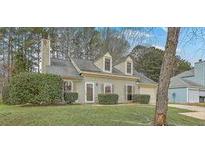 Charming one-story home with landscaped yard and inviting curb appeal is move-in ready at 158 Commons Way, Goose Creek, SC 29445