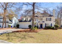 Charming two-story home with well-maintained landscaping, a two-car garage, and a welcoming front entrance at 1032 Black Rush Cir, Mount Pleasant, SC 29466