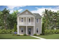 Charming two-story home with a welcoming front porch and classic architectural details at 318 Archar St, Summerville, SC 29486