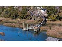 Beautiful waterfront property featuring a private dock and stunning views of the surrounding marshland at 1054 Anna Knapp Blvd # 4E, Mount Pleasant, SC 29464