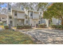 Attractive townhomes with private parking and mature landscaping for added curb appeal at 2765 Jobee Dr # 1303, Charleston, SC 29414