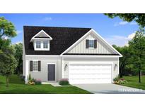 Charming one-story home with craftsman-style details and a well-manicured lawn, perfect for a starter home or downsizing at 472 Cadbury Loop, Summerville, SC 29486