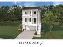 New construction three story home featuring double porches, green lawn, and two car garage at 722 Minton Rd, Charleston, SC 29412