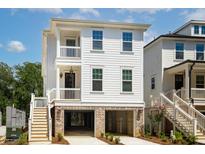Charming two-story coastal home with a covered porch, brick foundation and ample parking at 3158 Vanessa Lynne, Johns Island, SC 29455
