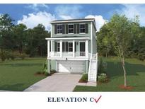 Charming two-story home boasts classic architecture, complemented by a well-manicured lawn and inviting facade at 742 Minton Rd, Charleston, SC 29412