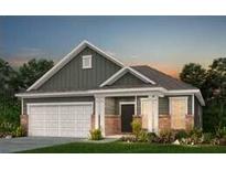 Charming single-story home with brick accents, a two-car garage, and a well-maintained front lawn at 117 Royal Cainhoy Way, Huger, SC 29450