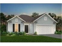 Charming single Gathering home with two-car garage and beautifully landscaped front yard at 152 Royal Cainhoy Way, Huger, SC 29450
