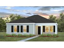 Charming single-story home featuring a welcoming front porch and manicured landscaping at 6226 Gritman Dr, Hollywood, SC 29470