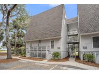 Charming two-story condo with a private balcony and convenient parking at 263 Sea Cloud Cir, Edisto Island, SC 29438