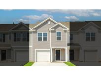 Charming home featuring a well-maintained lawn, attached garage, and light gray siding at 508 Golden Embers Way, Summerville, SC 29486