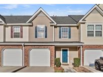 Charming townhome featuring a brick foundation, siding and attached one car garage at 303 Pine Bluff Dr, Summerville, SC 29483