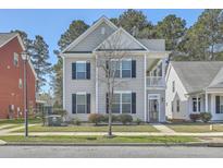 Charming two-story home with a cozy front porch and traditional curb appeal at 3073 Moonlight Dr, Charleston, SC 29414