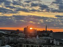 Sunset cityscape view shows the city skyline and a beautiful sunset sky at 330 Concord St # 9C, Charleston, SC 29401