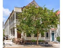 Charming two-story home with a well-maintained front yard and welcoming entrance at 90 Spring St # Ab, Charleston, SC 29403