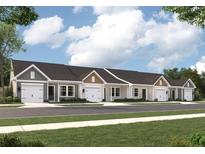 Charming townhome exteriors boast attached garages, and well-manicured lawns with appealing design elements at 943 Dusk Dr, Summerville, SC 29486