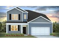 Charming two-story home featuring a two-car garage, black shutters, and a well-manicured lawn at 405 Mistflower Ln, Moncks Corner, SC 29461