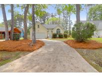Charming single story home featuring a one car garage and well manicured landscaping at 1174 Pittsford Cir, Charleston, SC 29412