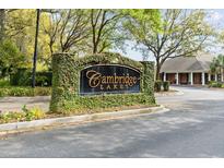 Cambridge Lakes entrance sign with lush greenery, brick accents, and manicured landscaping at 1597 Cambridge Lakes Dr # 303E, Mount Pleasant, SC 29464