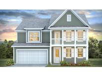 Two-story home with a covered porch, white trim, gray siding, and an attached two-car garage at 210 Bilge Rd, Ridgeville, SC 29472